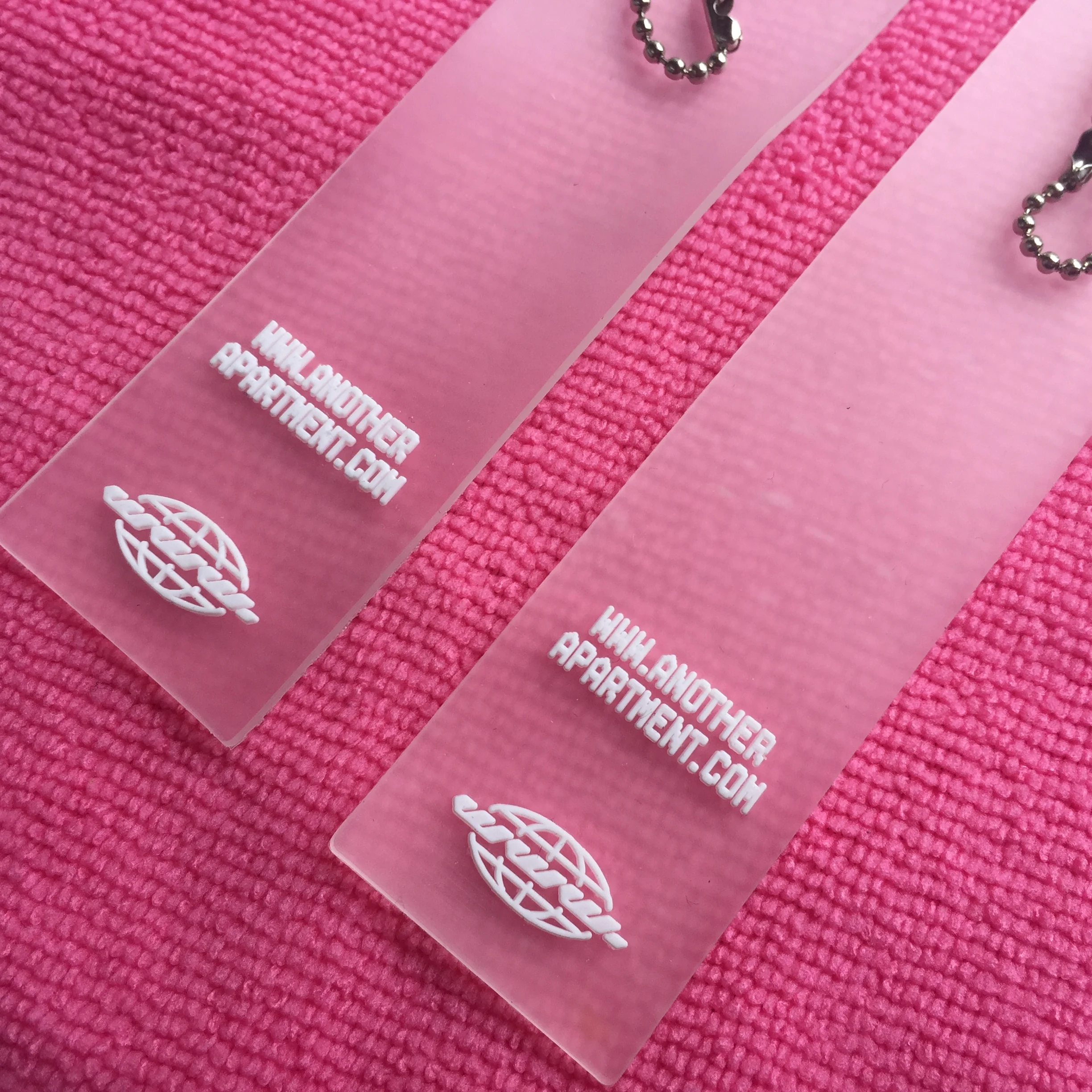 custom logo clear PVC hangtag,transparent rubber logo hang tag for garment