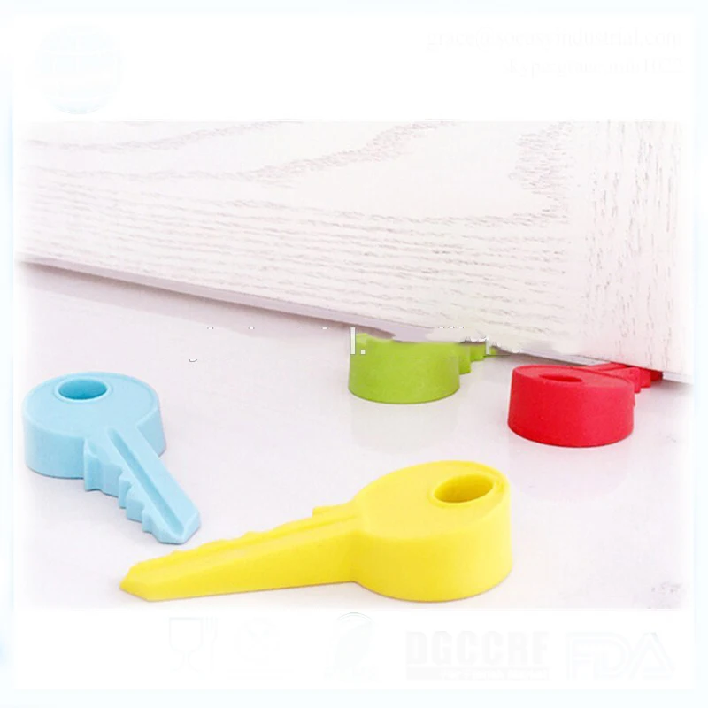 Novelty wedge key shape silicone door stops