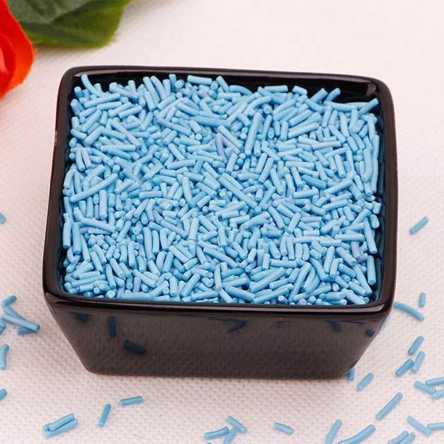 Съедобные праздничное нарядное Jimmies/вермишель брызгает в синий