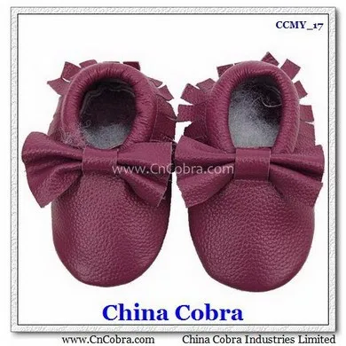 
CHINA COBRA top quality soft sole leather baby moccasins shoes without the characters on them with fringe on them 