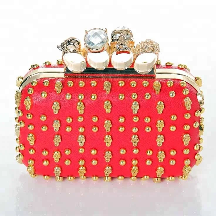 
Classic wholesale elegance bags skull rivets banjara clutch bags with four rings closure 