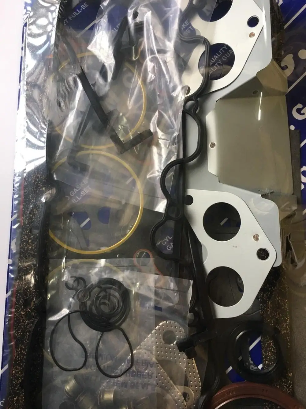 Полный комплект прокладок OEM 8AGA-10-271 для двигателя MAZDA F2