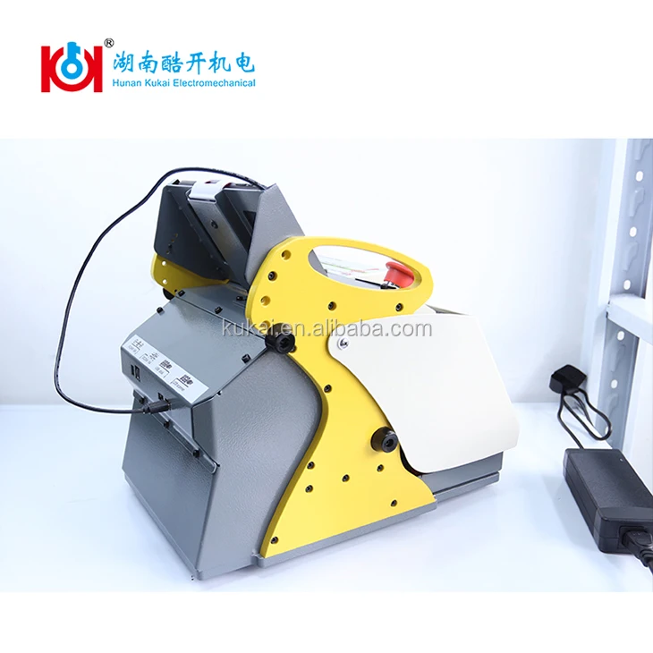 Free shipping lowest SEC-E9 automatic key cutting machine car duplicate machine car key copy machine with multi language