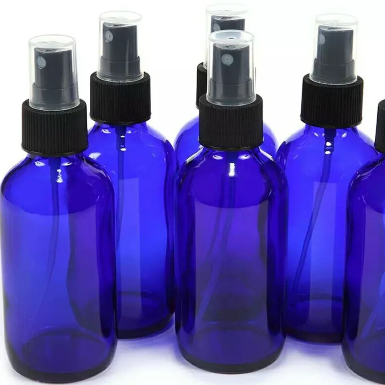 Alibaba china supply 50 ml 100ml clear amber blue green glass spray bottles for face cosmetic lotion