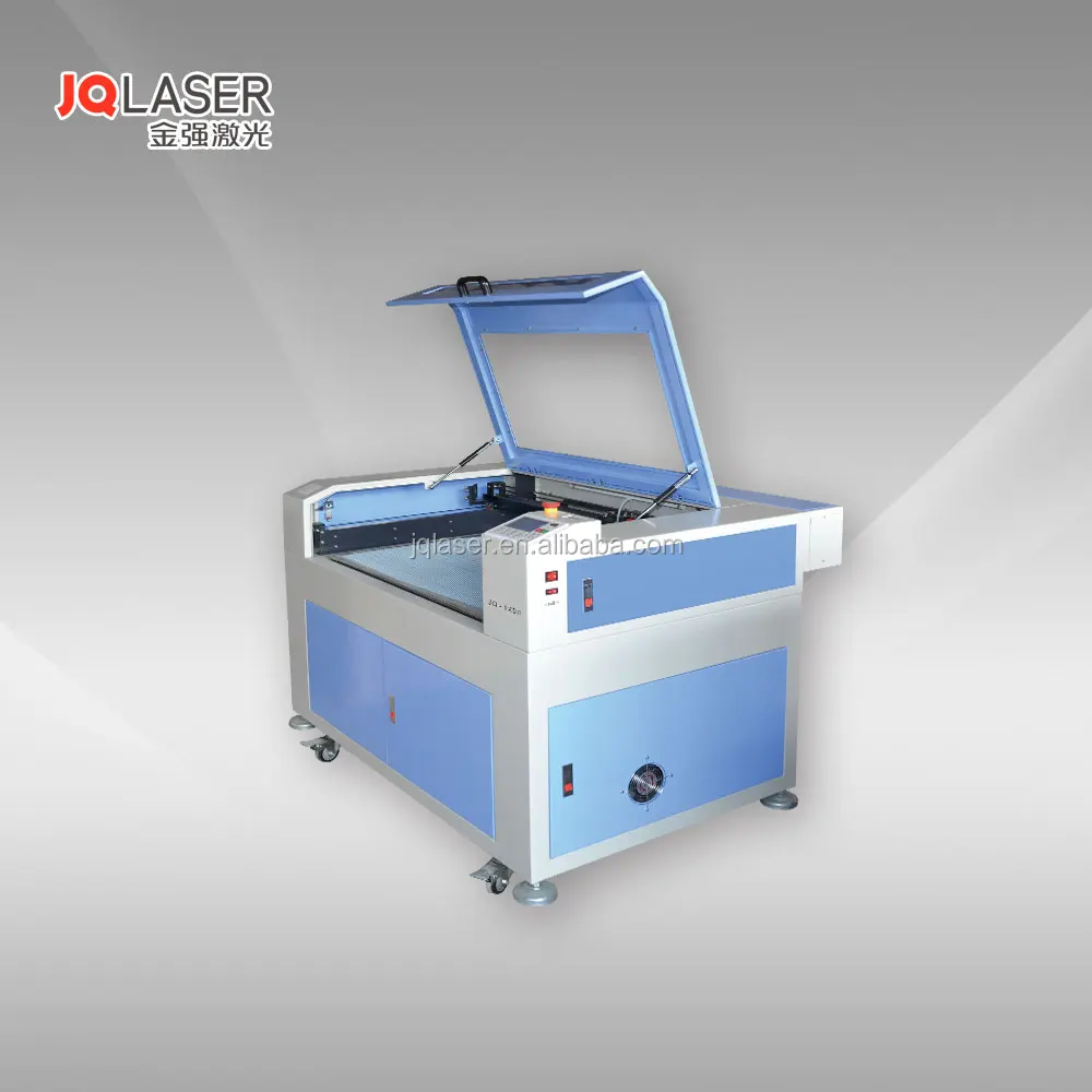 JQ Jinan Jinan Easy operation and hot sale blue and white MDF/wood CO2 laser engraving machine price 2600-3000USD