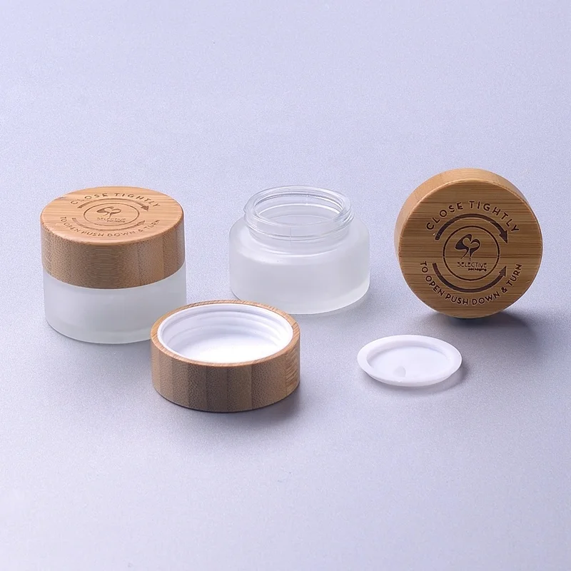 bamboo cosmetic packaging bamboo child resistant child proof cap frosted glass jar with bamboo lid