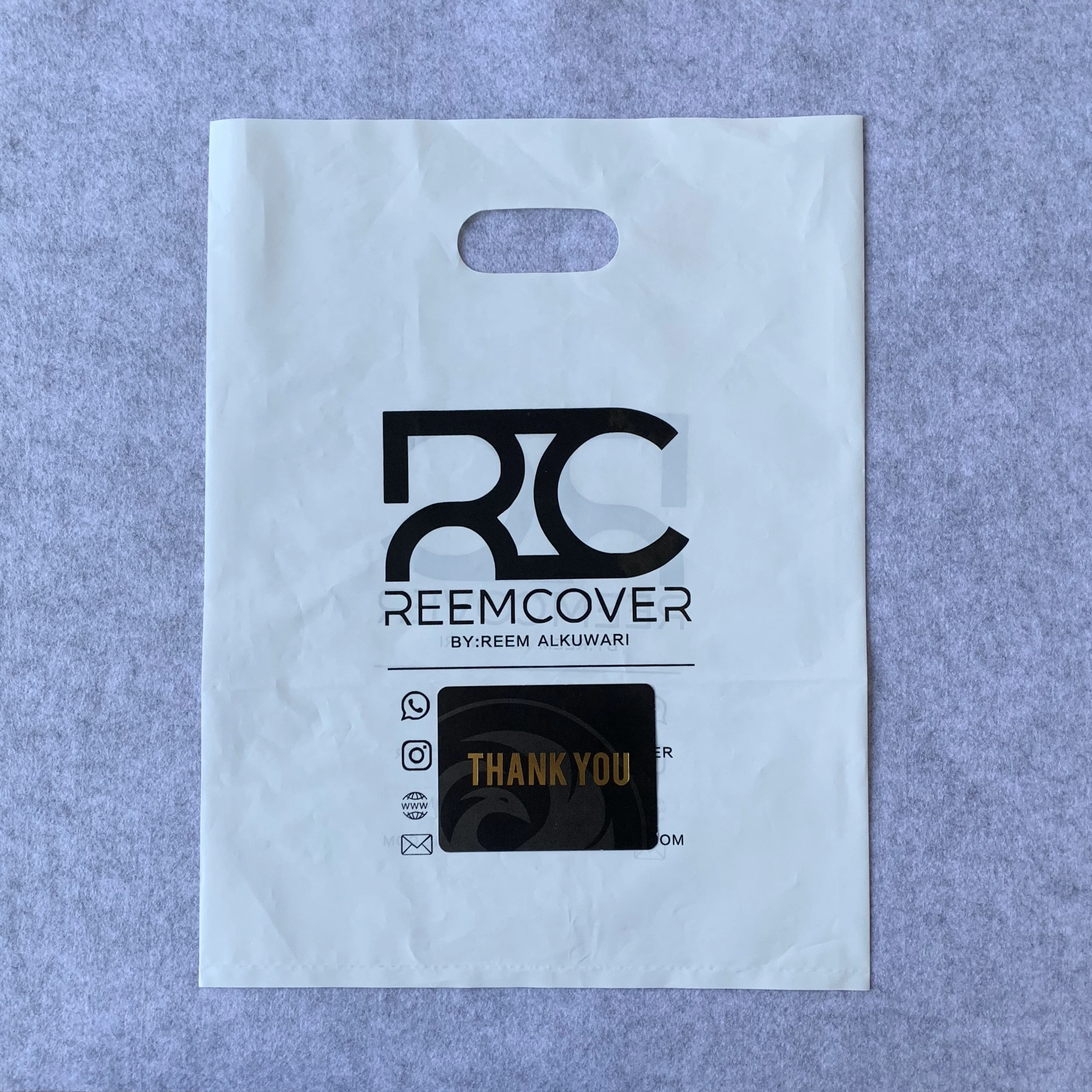 Custom Size Printing Plastic Custom Made Shopping Bags with Die Cut Handle