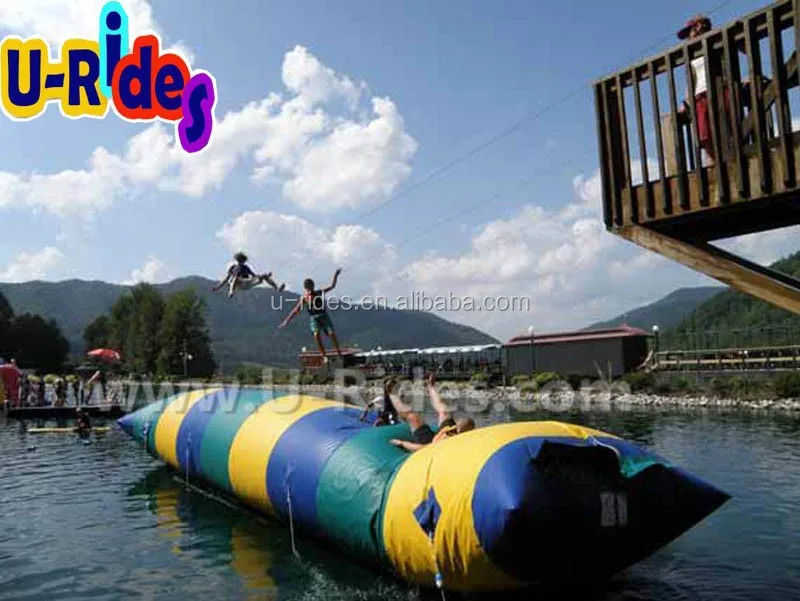 Custom lake water game 10 meter long air sealed water jumping pillow blob inflatable water catapult blob for kids and adult