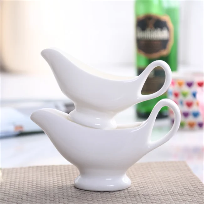 
China suppliers ceramic creamer pot,gravy boat,White Honeycomb Gravy Boat For Sauce Service 