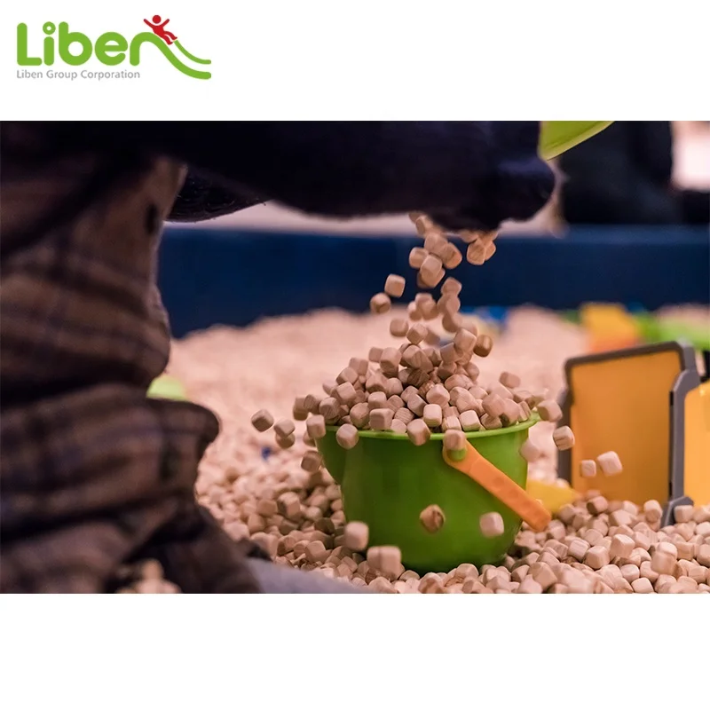 Древесные гранулы песка ямы из Liben группы может пригодиться для крытой игровой площадки и
