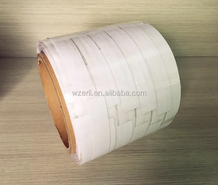 adhesive carry handle roll tape for multipacks used by the handle applicator