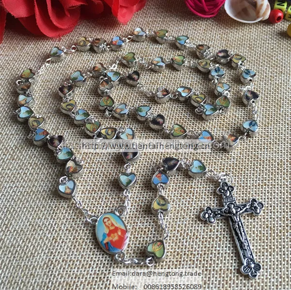 mix catholic figures on alloy heart rosary which is mixed with saint icon and virgin mary centerpiece
