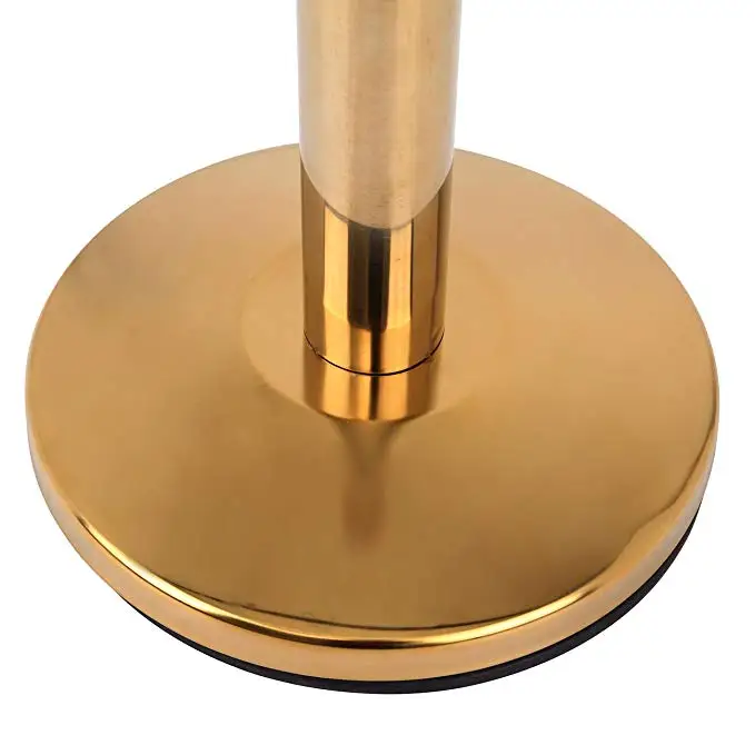golden barrier stanchion set with red velvet rope