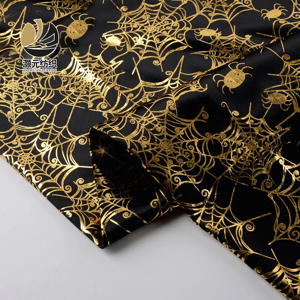 Customized gold shiny printed knitting bronzing fabric with cobweb pattern gold shiny fabric