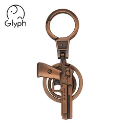 Wholesale 3d bronze fancy gun shaped keychain handmade craft keyring for promotional gift