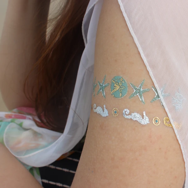 Skin safe metallic golden temporary body gold tattoo sticker