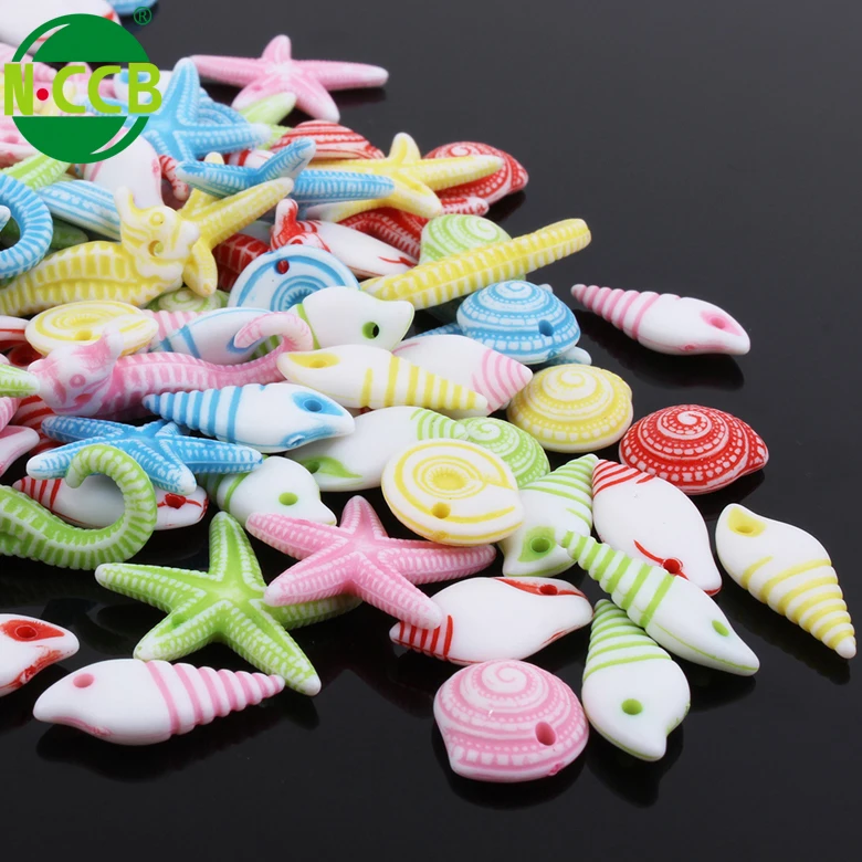 Popular assorted starfish, sea horse, conch shaped custom engraved animal plastic beads