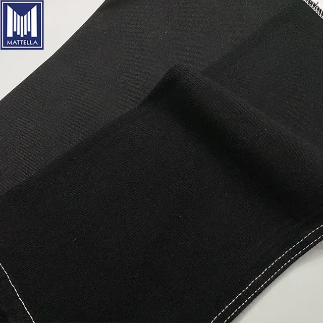 cheap wholesale stock price black warp black weft waxed 75% cotton 25% polyester blend denim fabric