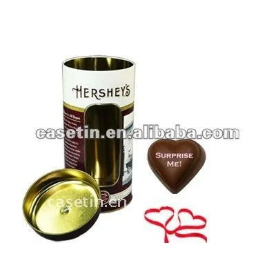 cylindrical brown empty chocolate packaging tin box