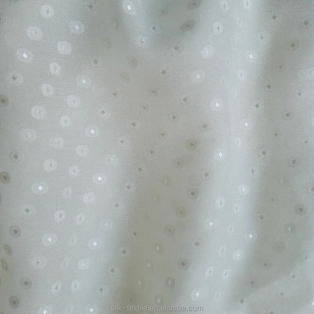 
silk visco chiffion jacquard and cut in dots design 