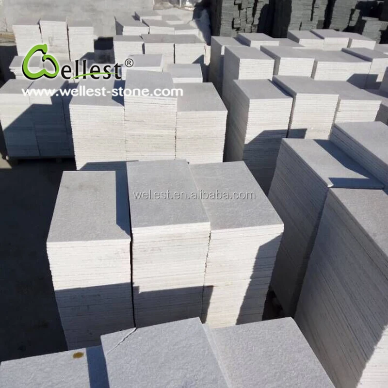 Natural white quartzite marble drop face coping and paver for pool and spa with flamed and non slippery finish