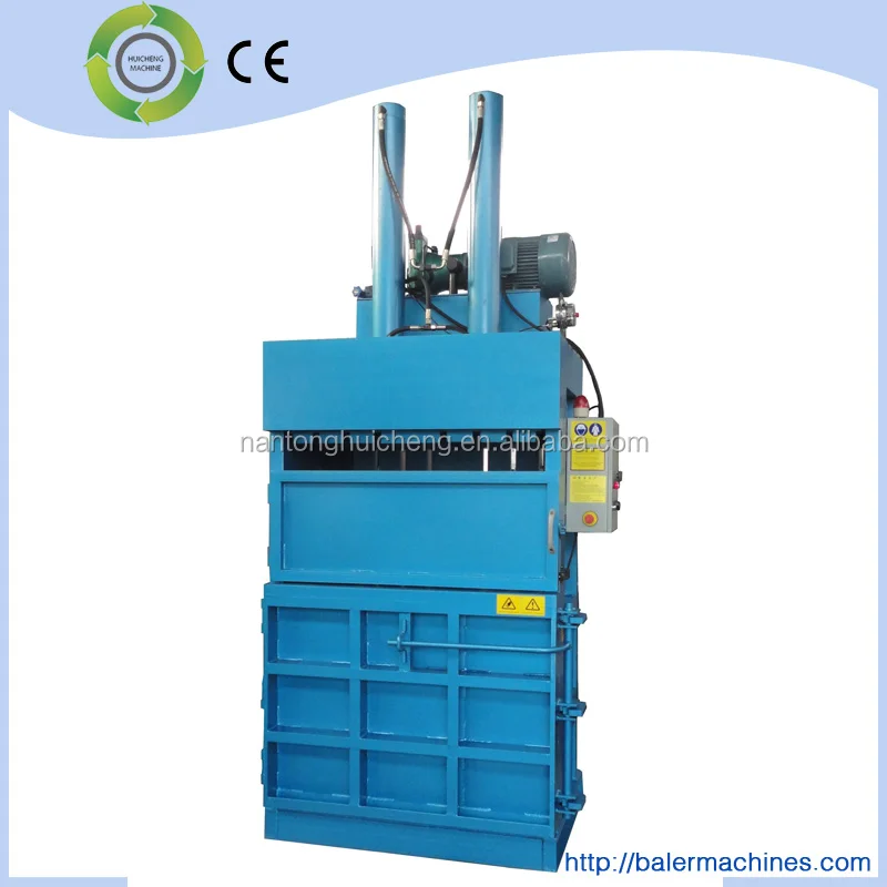 Plastic scrap, paper, cotton and woodchips compress baler machine