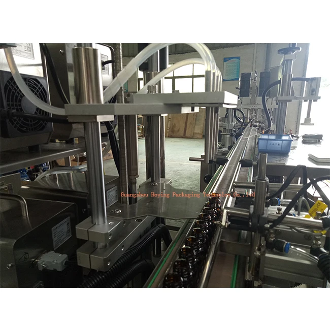 Medium capacity 1000 bottes/h automatic lotion bottle filling capping labeling machine