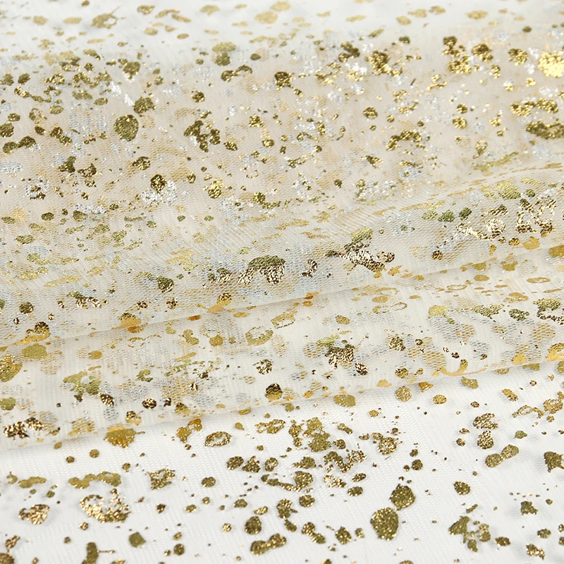 Wholesale polyester golden transparent spotted flash mesh fabric for clothing