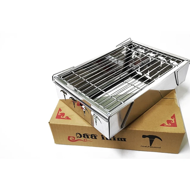 
Camping disposable portable foldable stainless steel mini bbq charcoal grill stove on table 