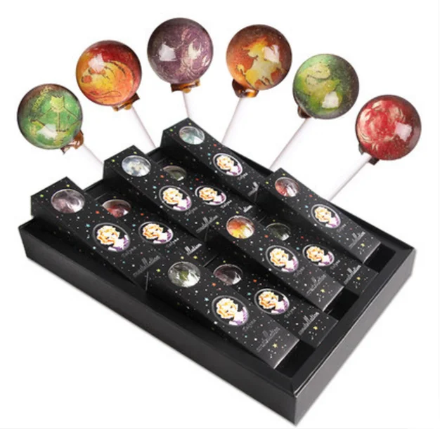 Изготовленные на заказ леденцы с 12 планетами