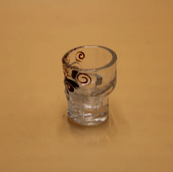 Colored skull shaped shot glasses cup