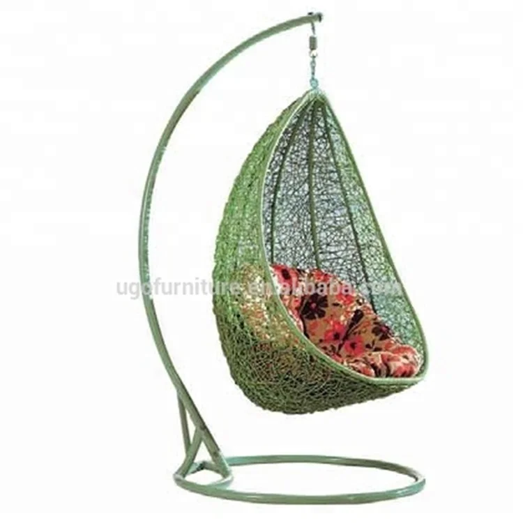 
Double sitting in outdoor wicker swing chair standing in beach hammock popular hammock 