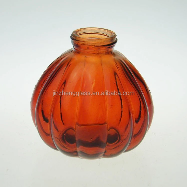 Orange Colour pumpkin shaped glass perfume bottle with screw cap