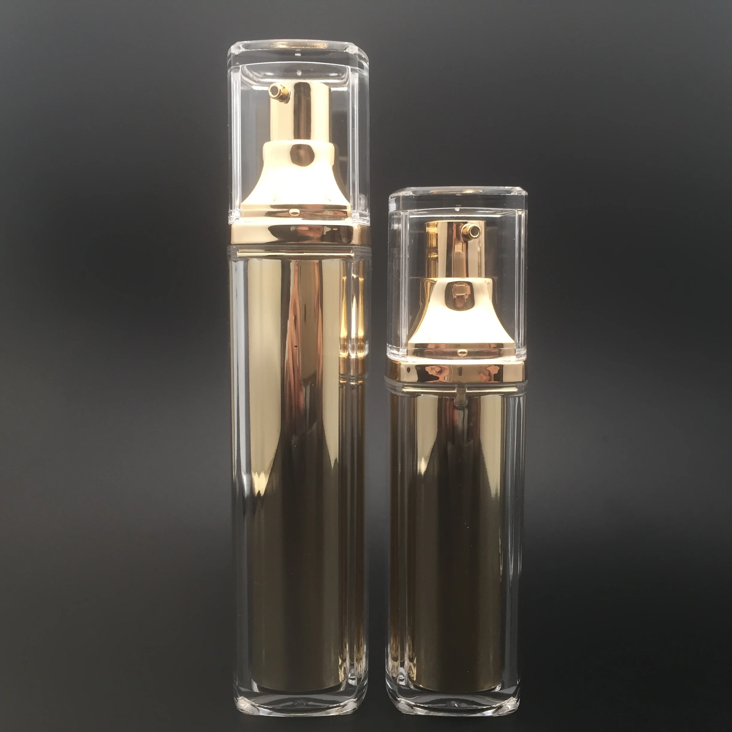 
UV coated gold acrylic airless serum bottle for rectangle shape 