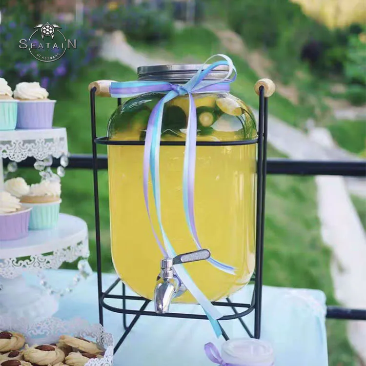 High quality glass honey syrup beverage drink dispenser with gold lid and frame
