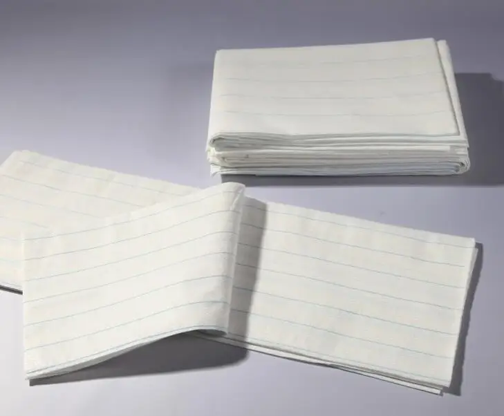 Disposable surgical bed draw sheet with and without threads