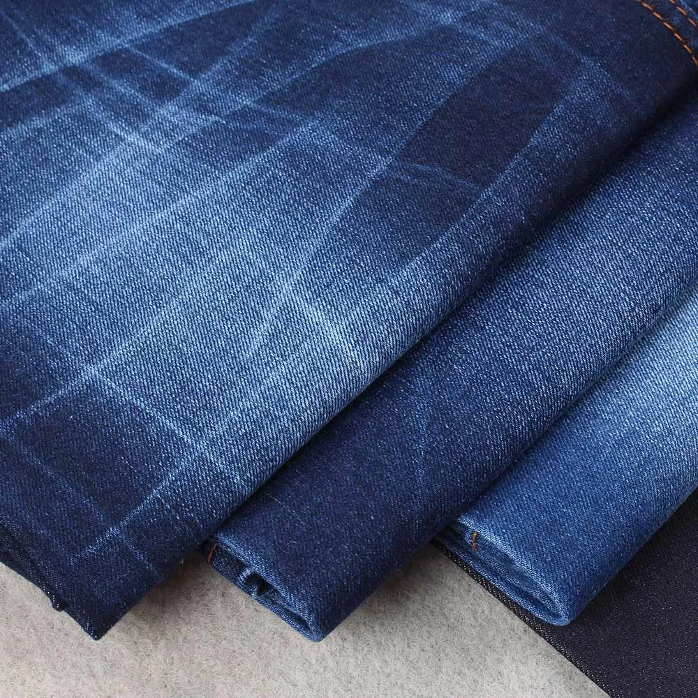 Ready goods in stock very hot sell item 11oz super dark blue denim fabric jeans for men buy from china