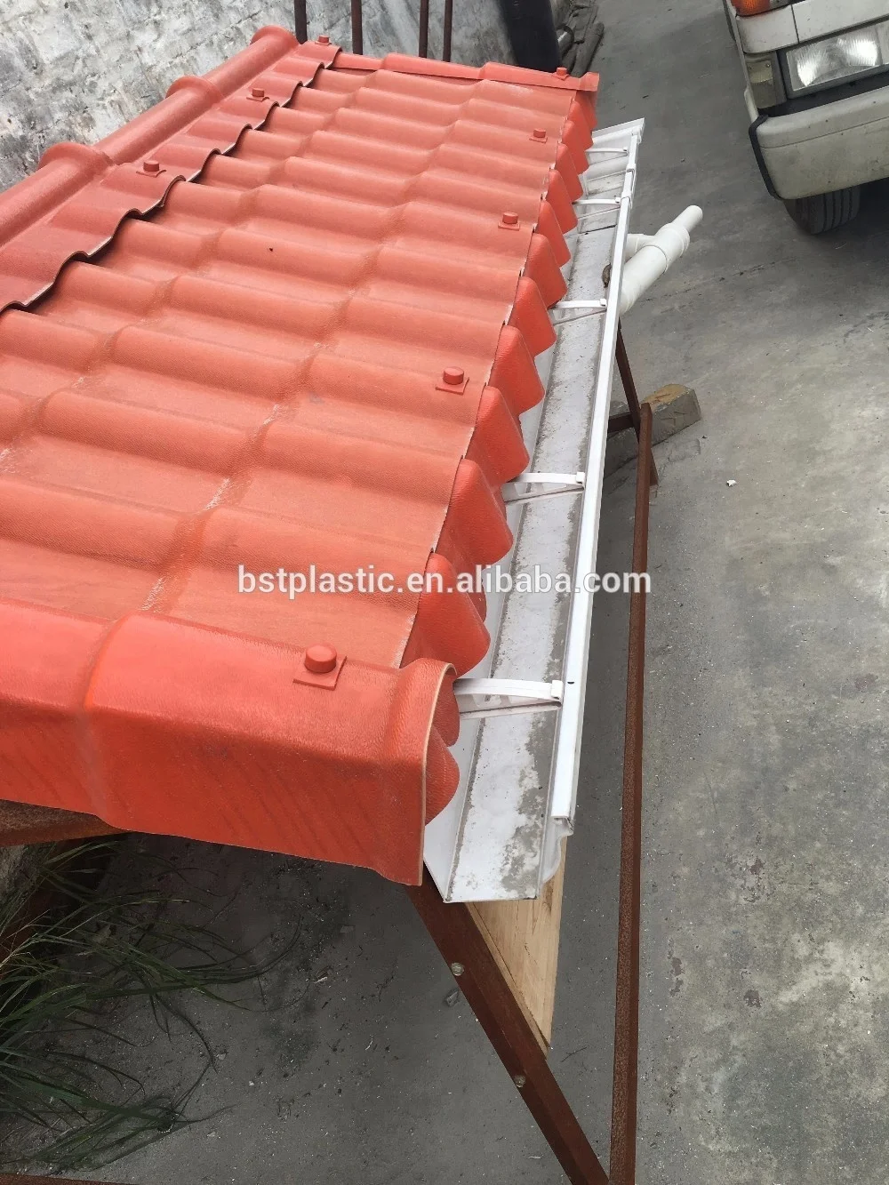 A large number of plastic rain gutter exported to India