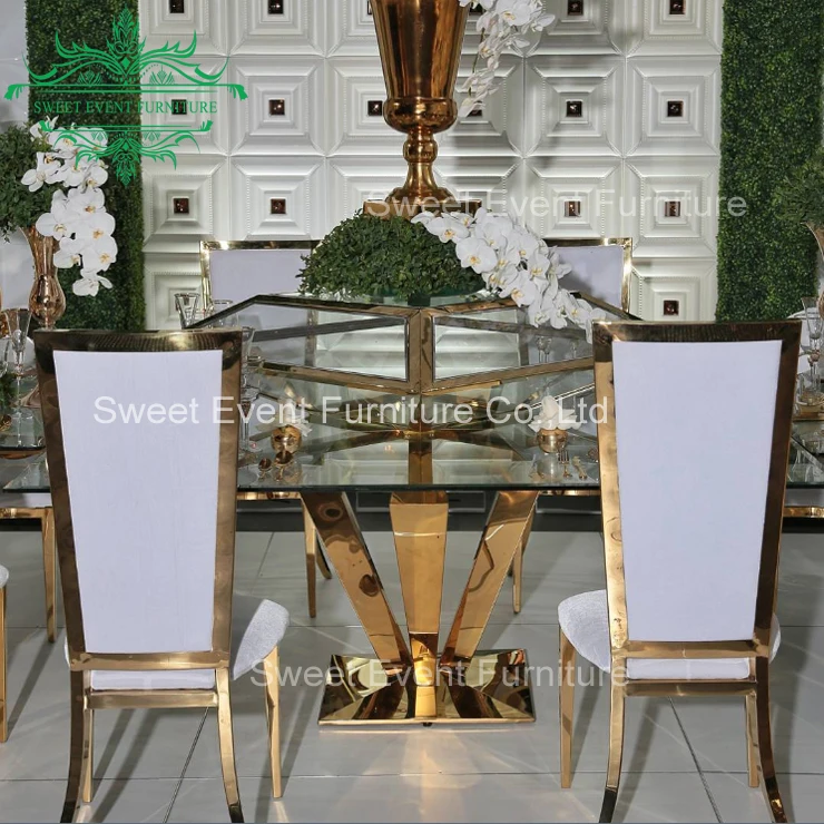 Clear glass top wedding reception chairs and tables with ss base