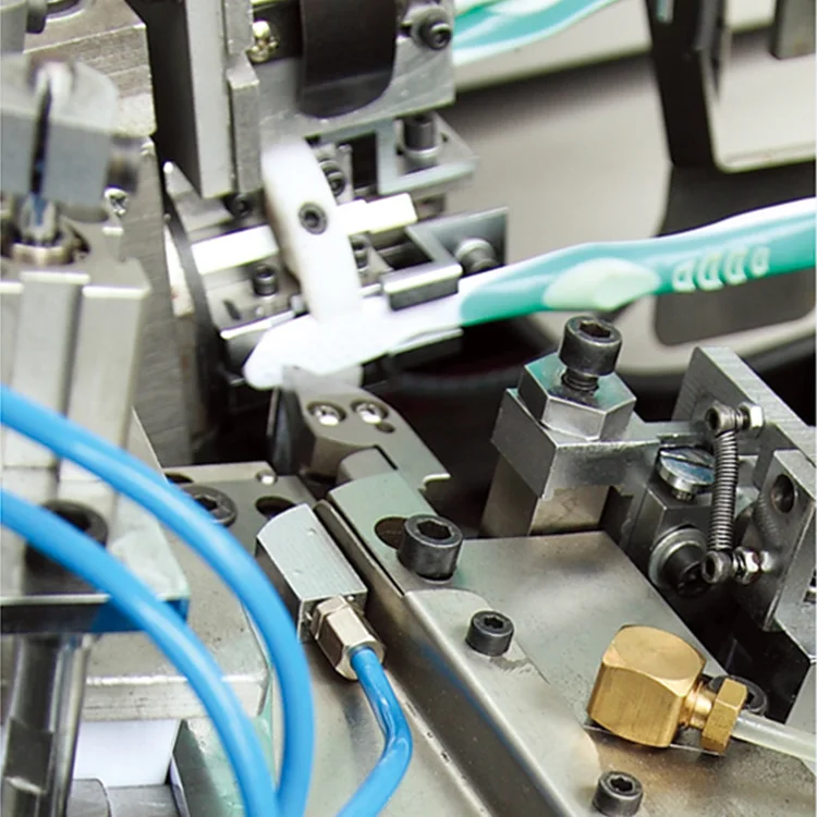 Cost effective high speed cnc 3 colors 4 axis cnc toothbrush machine tufting for brush making