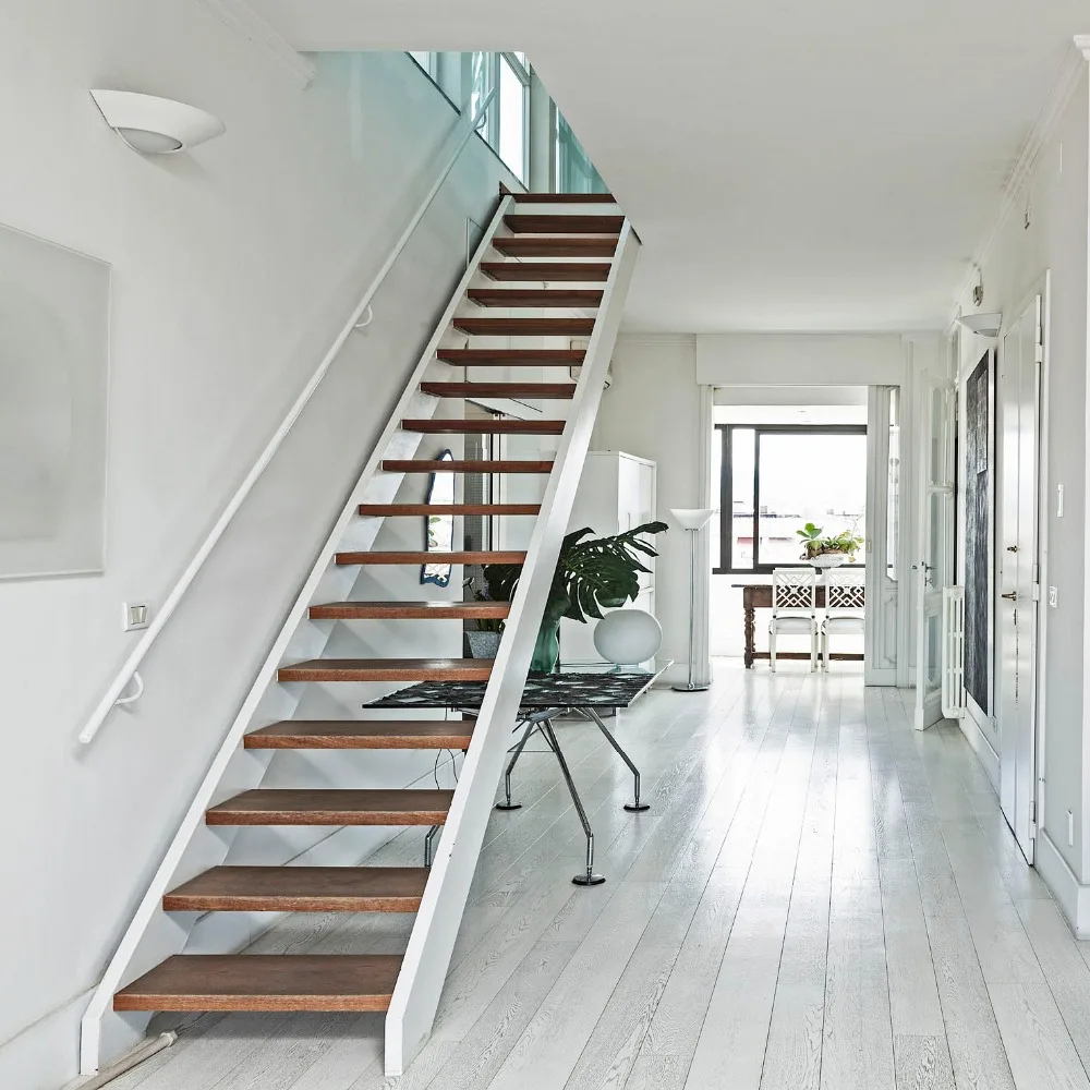 Hard wood steps and tempered glass railing Interior Steel wood staircase