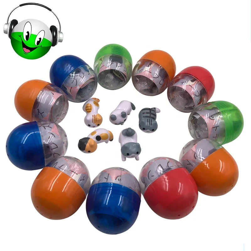 
Cat hanging on the rim of the glass Vending Bulk Capsule Toys Whosale 