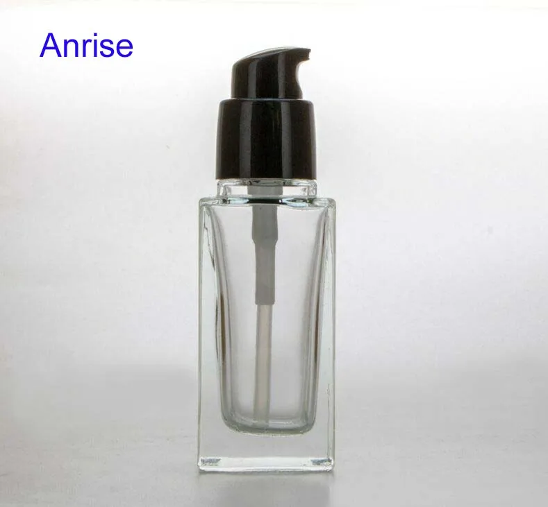 Distinctuve 30ml 50ml Square Clear Glass Cosmetic Essence Bottle Refillable Serum Squeeze Spray Bottle with Black Cube Cap