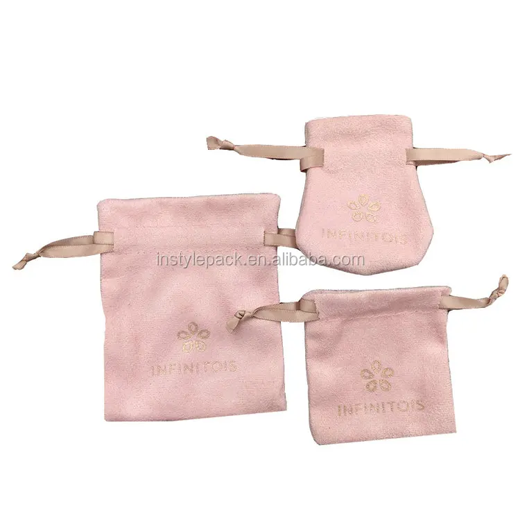 small pink velvet jewelry pouch with tassel drawstring