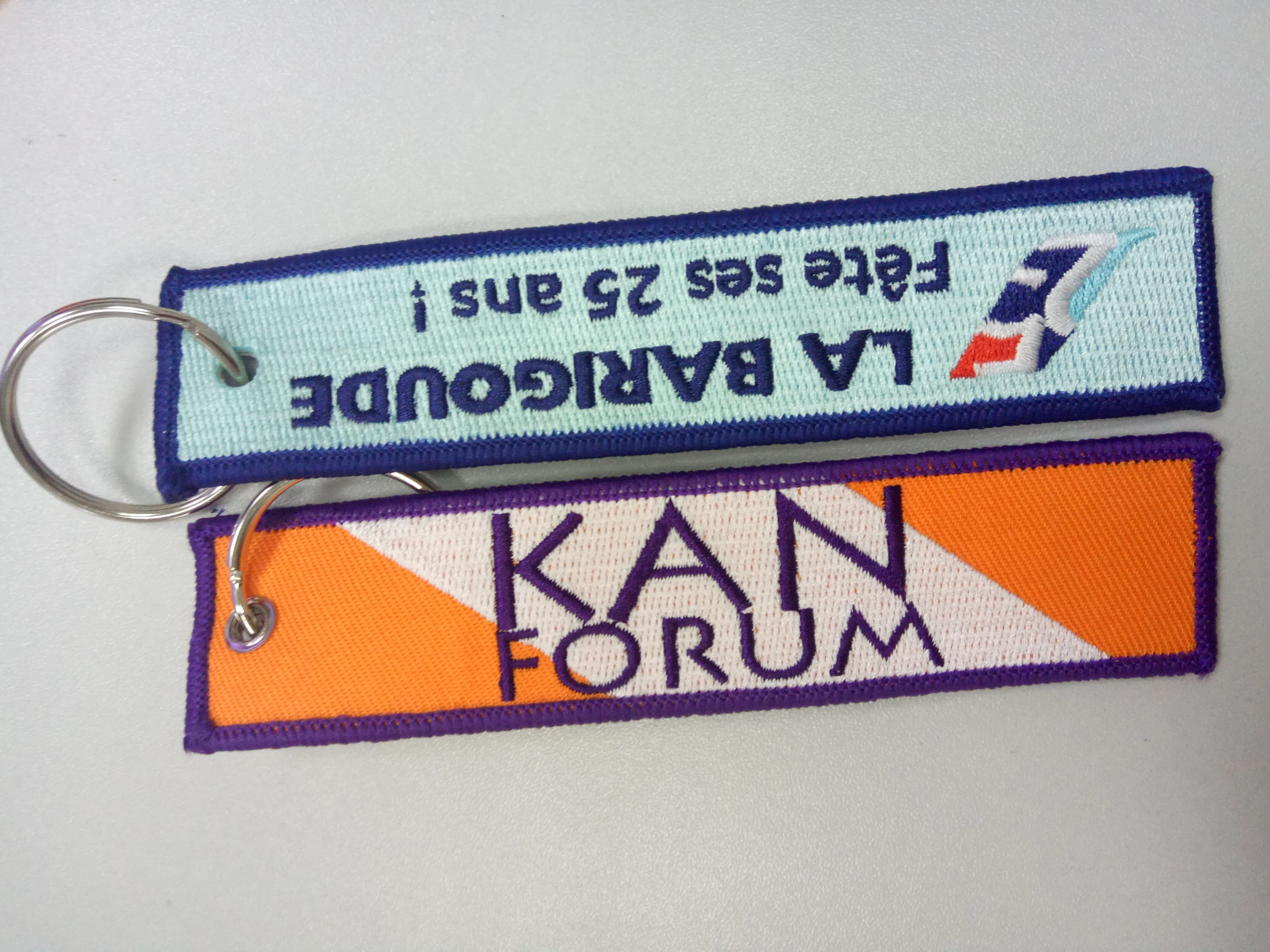 China factory direct custom Flight embroidery keychain woven key tag with your own logo