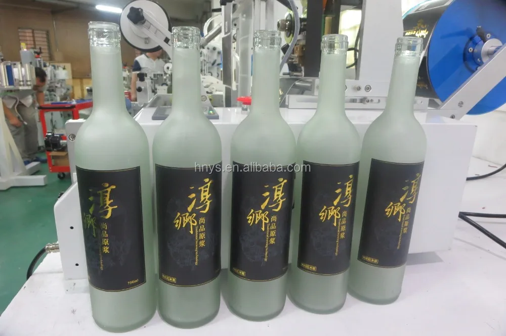 
semi automatic labeling machine jars containers round objects round bottles label applicator 