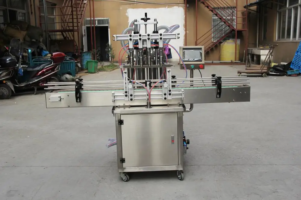 Four head filling machine water juice automatic shampoo liquid filler,auto filler heads with conveyor PLC control