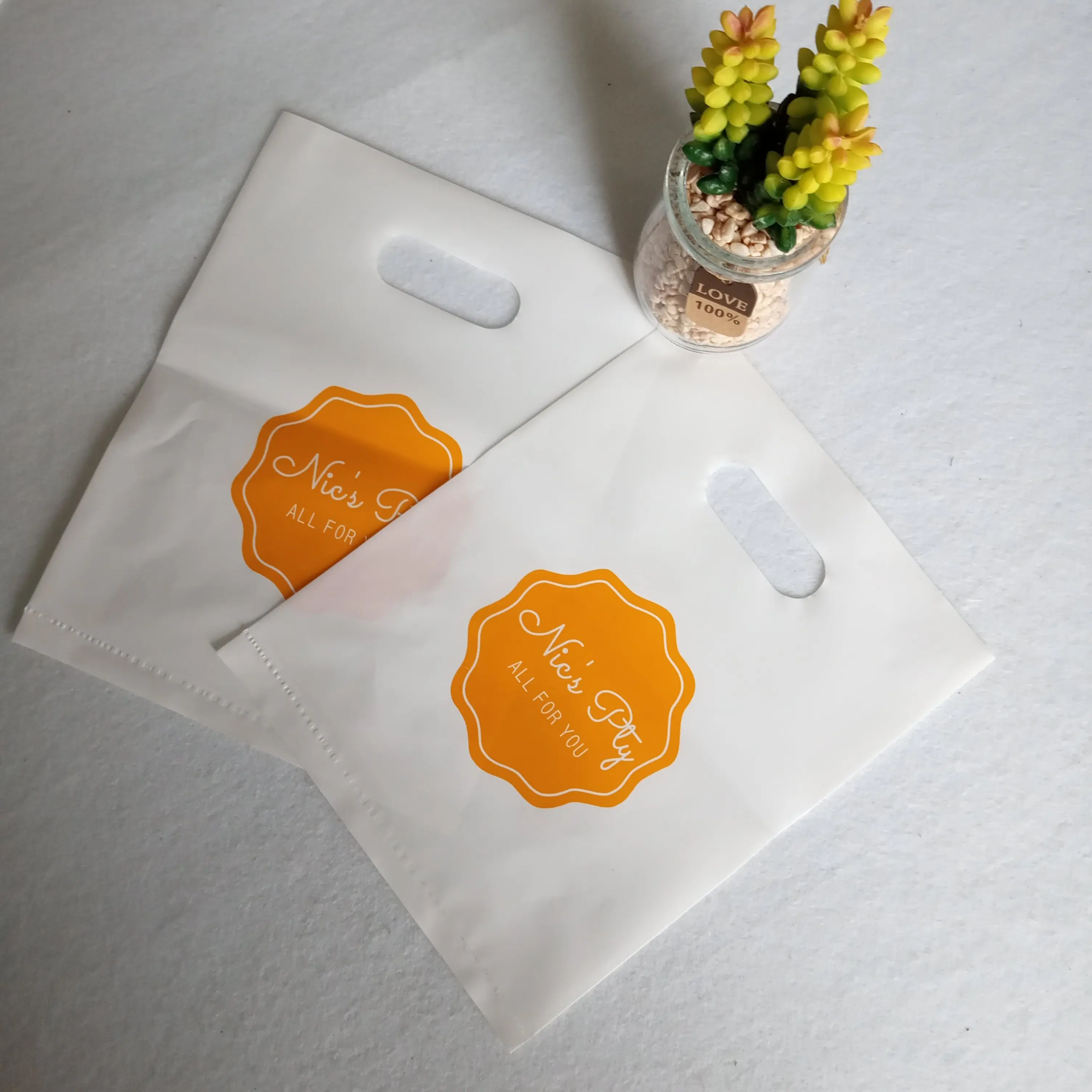
PE/LDPE 100% Biodegradable Die cut Custom Printing Shopping Plastic Bags With Own Logo for Wholesale price 