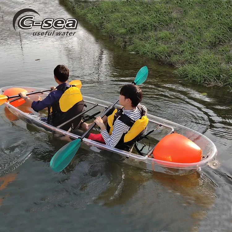 2 person sit in clear bottom kayak