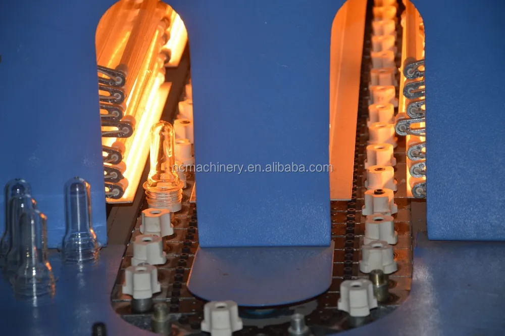 Auto Dropping Semi Automatic 4 Cavity Soda Water Bottle Blow Molding Machine